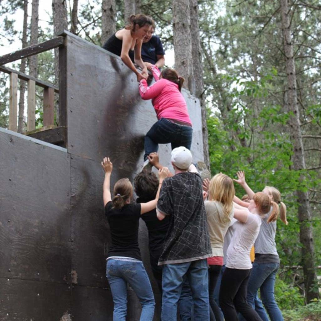 Students Work Together to Overcome An Obstacle Course